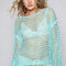 POL Side Slit Openwork Long Sleeve Knit Cover Up in blue with textured openwork design and side slits.